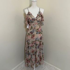 Flirty, floral high low dress.